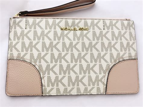 michael kors wrist wallet women pink|Michael Kors purses vanilla pink.